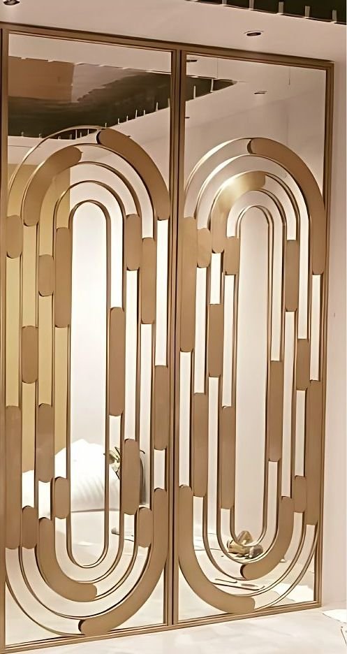 Art-deco patterned brass screen doors with slim vertical handles