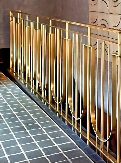 Brass baluster railing on a terrace