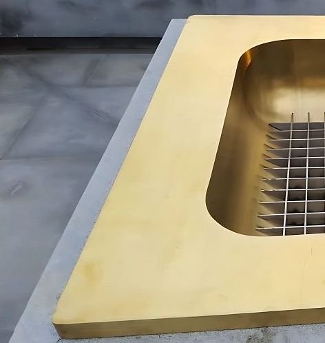 Brass fire panel and hearth detail