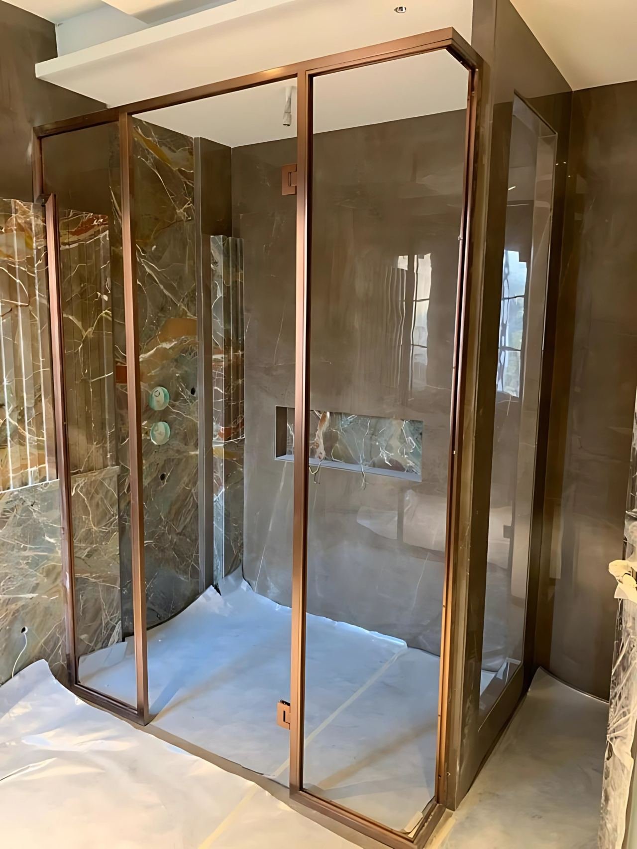 Brass-framed shower cubicle