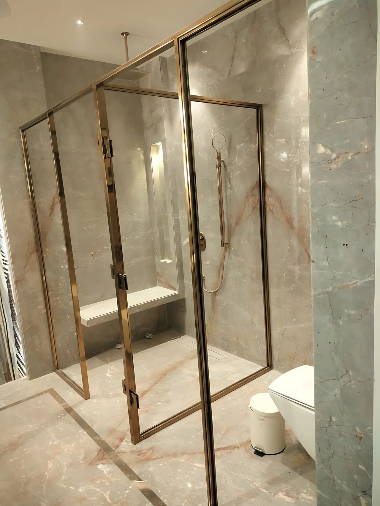 Brass-framed shower cubicle