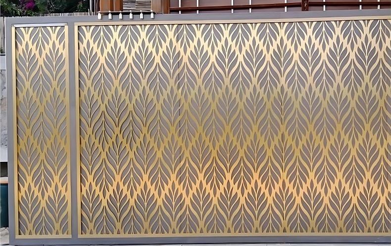 Brass laser-cut screen gate on a boundary wall