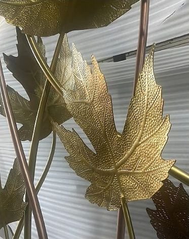 Detail of a brass leaf sculpture