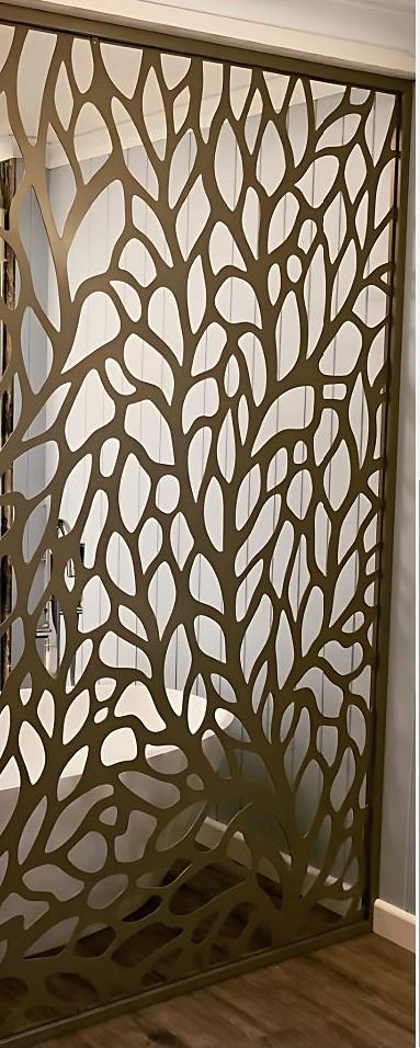 Brass screen with an organic branching pattern
