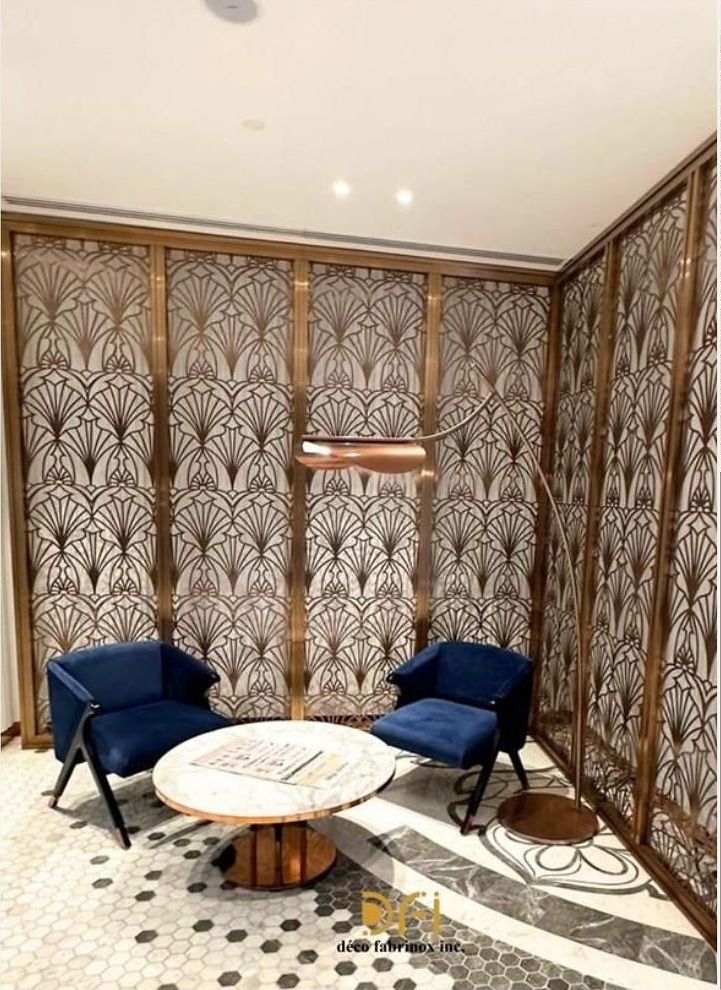 Brass screens enclosing a hotel lounge seating area