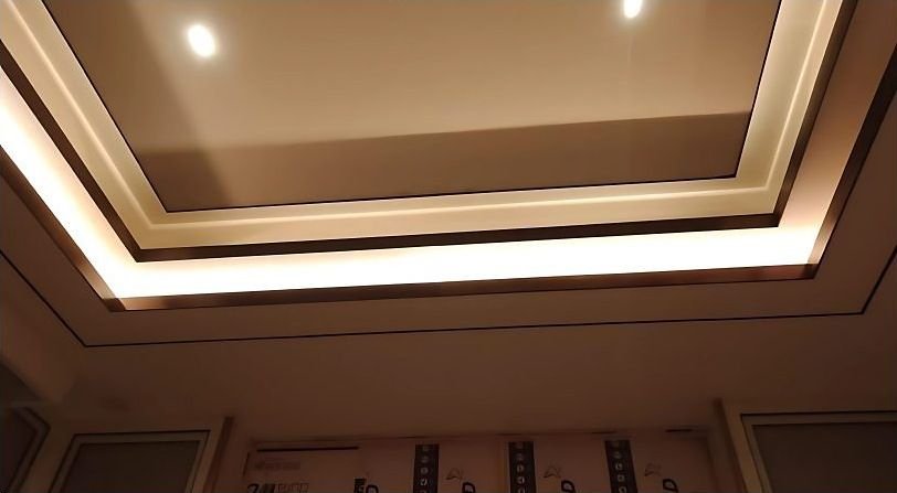 Brass trim on a coffered ceiling