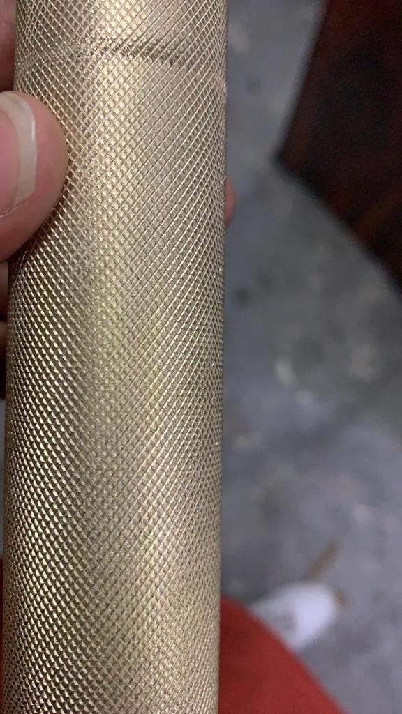 Cast and embossed metal sample