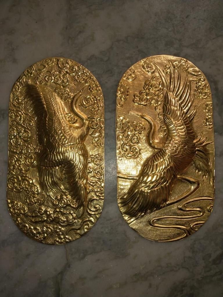 Cast and embossed metal sample