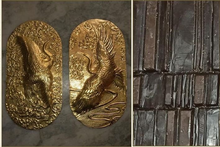 Cast metal relief plaques and an embossed bark-textured panel