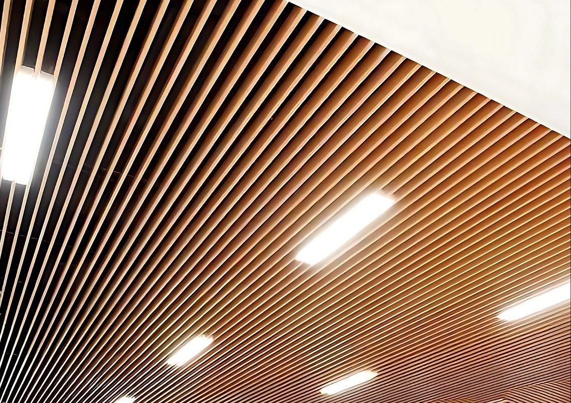 Copper baffle ceiling running the length of a corridor