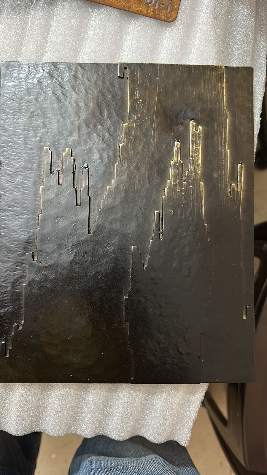 Embossed metal finish sample
