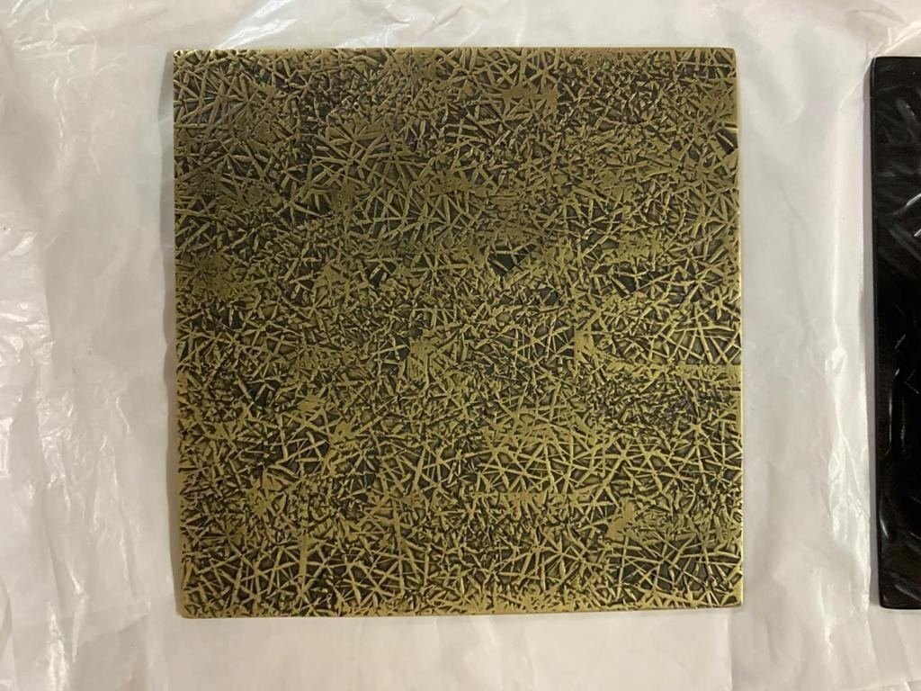 Etched metal finish sample