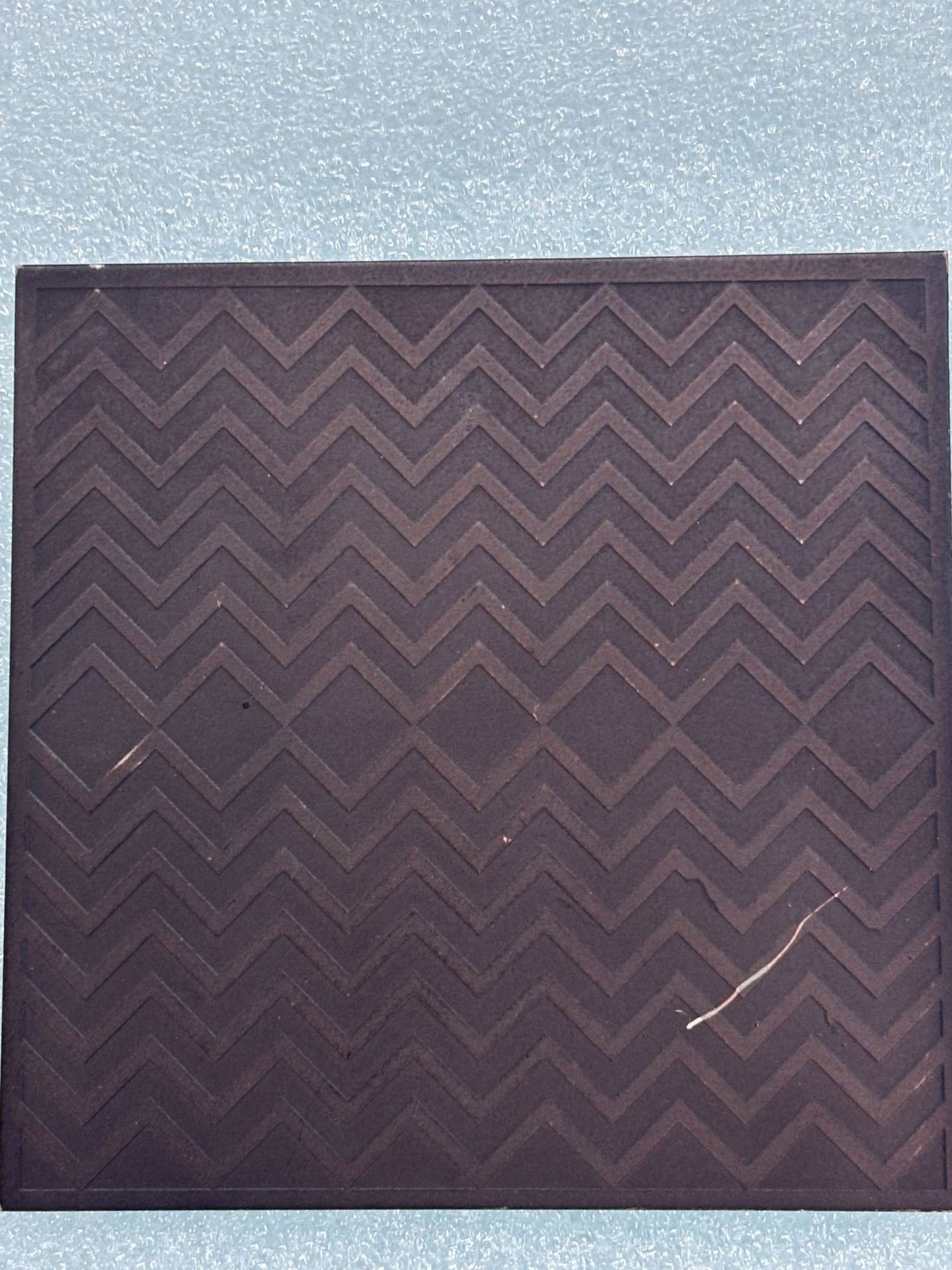 Etched metal finish sample