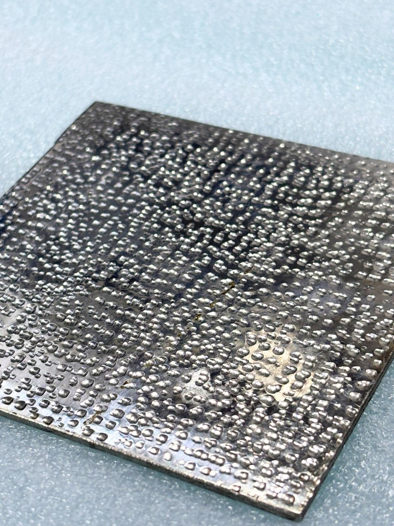 Etched metal finish sample