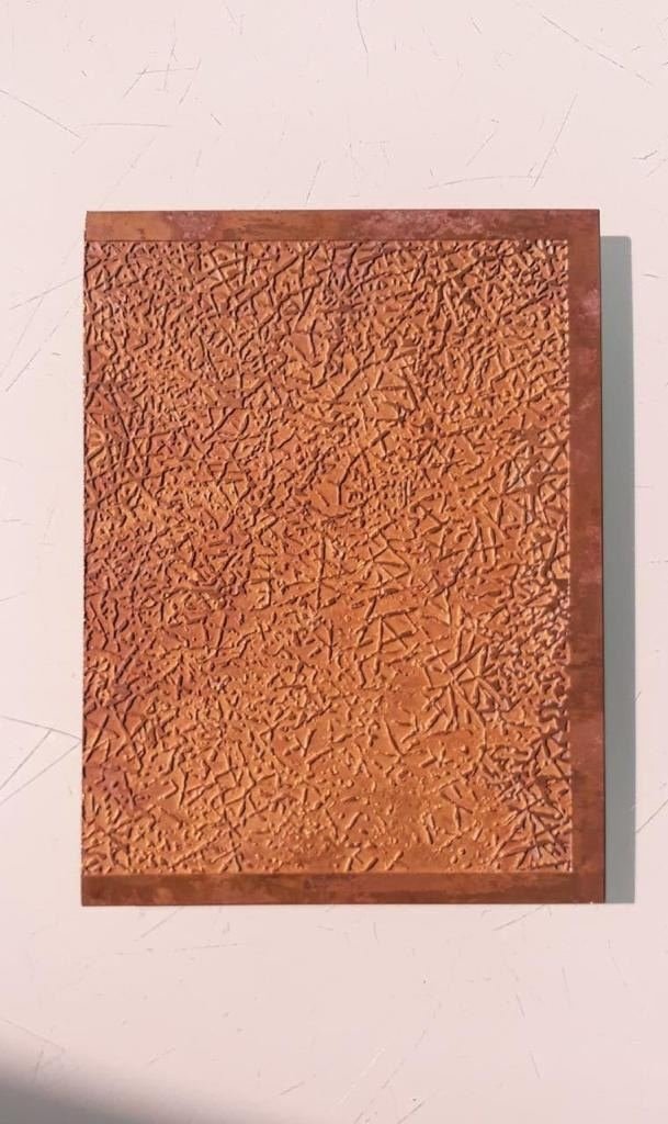 Etched metal finish sample