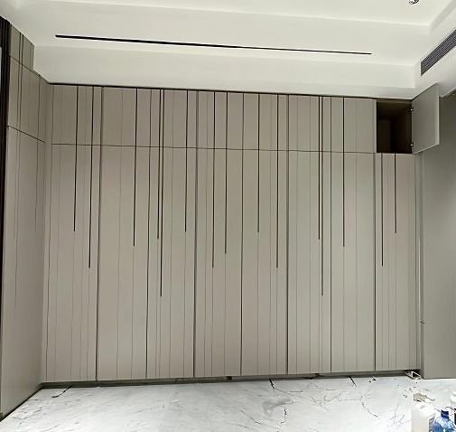 Fluted metal wall cladding running floor to ceiling
