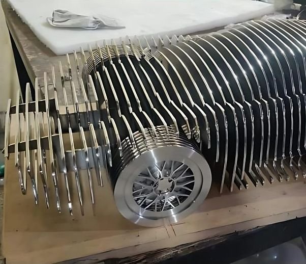 Laser-cut steel sculpture of a car built from stacked profiles