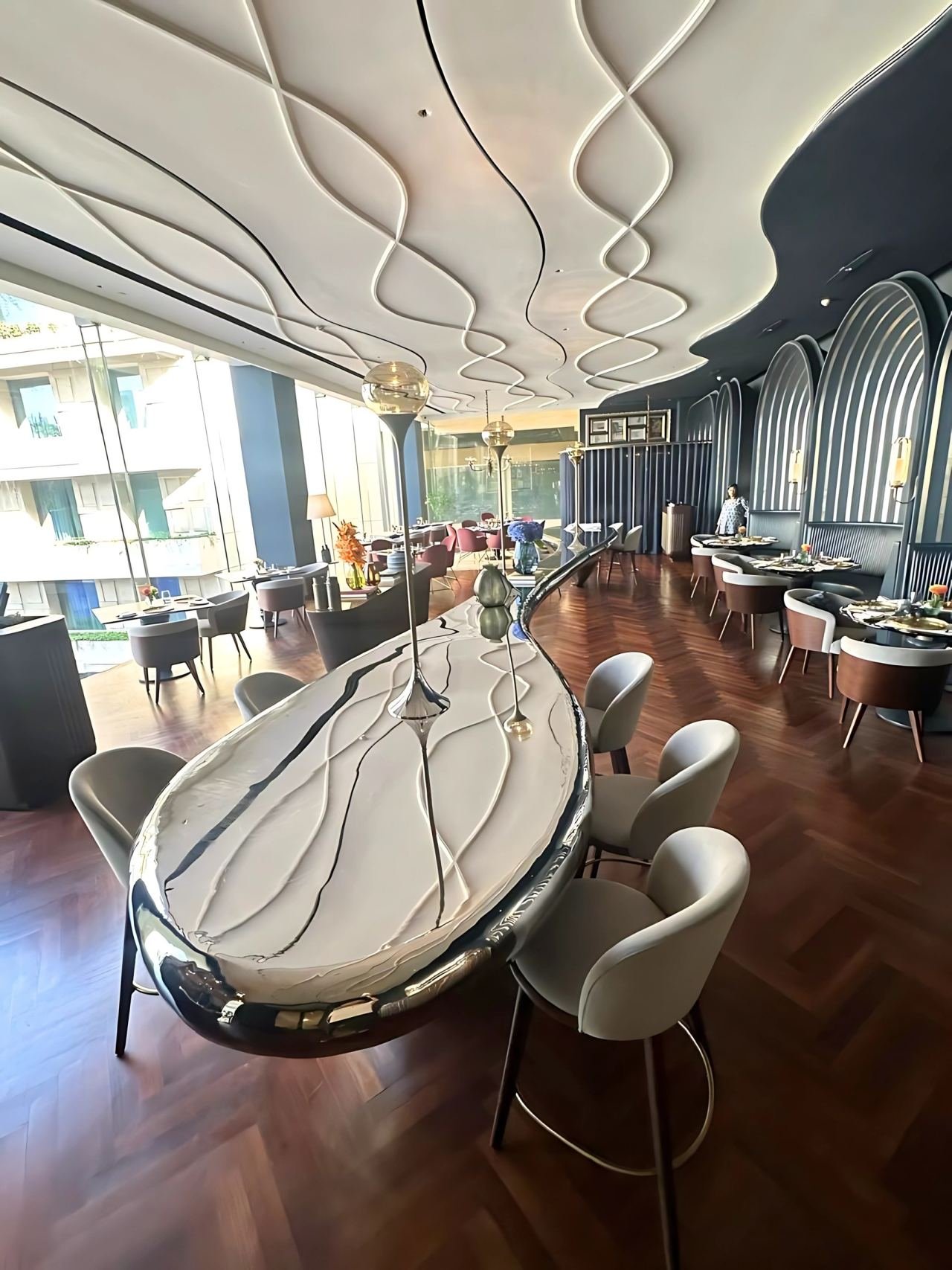 Metal-framed furniture in a hospitality interior