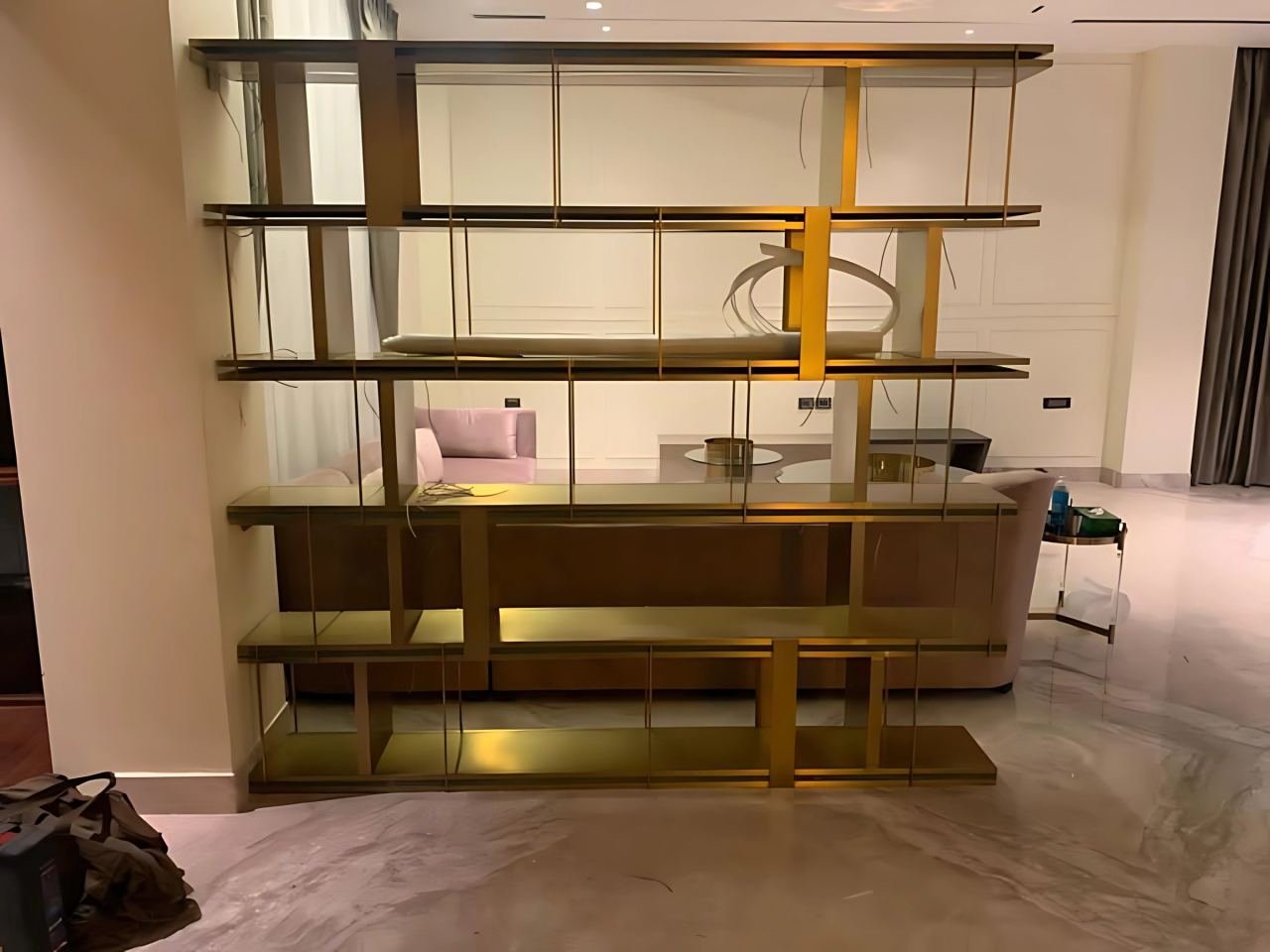 Metal shelving and console in a residential interior