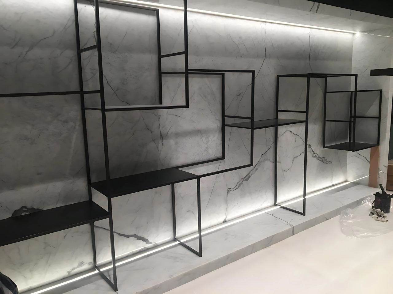 Metal shelving and console in a residential interior