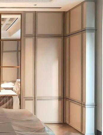 Fine metal trim wall panelling in a bedroom