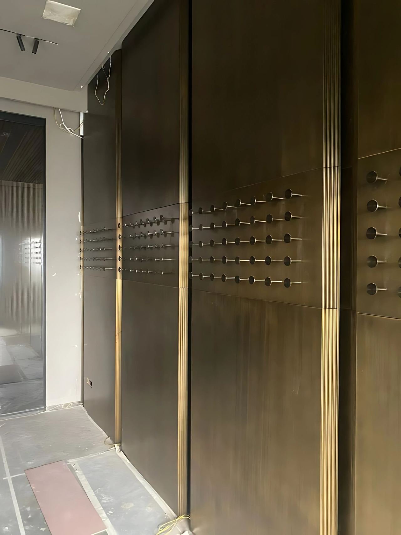 Metal wall cladding