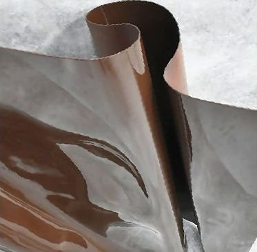 Mirror-polished copper sculpture with a folded surface