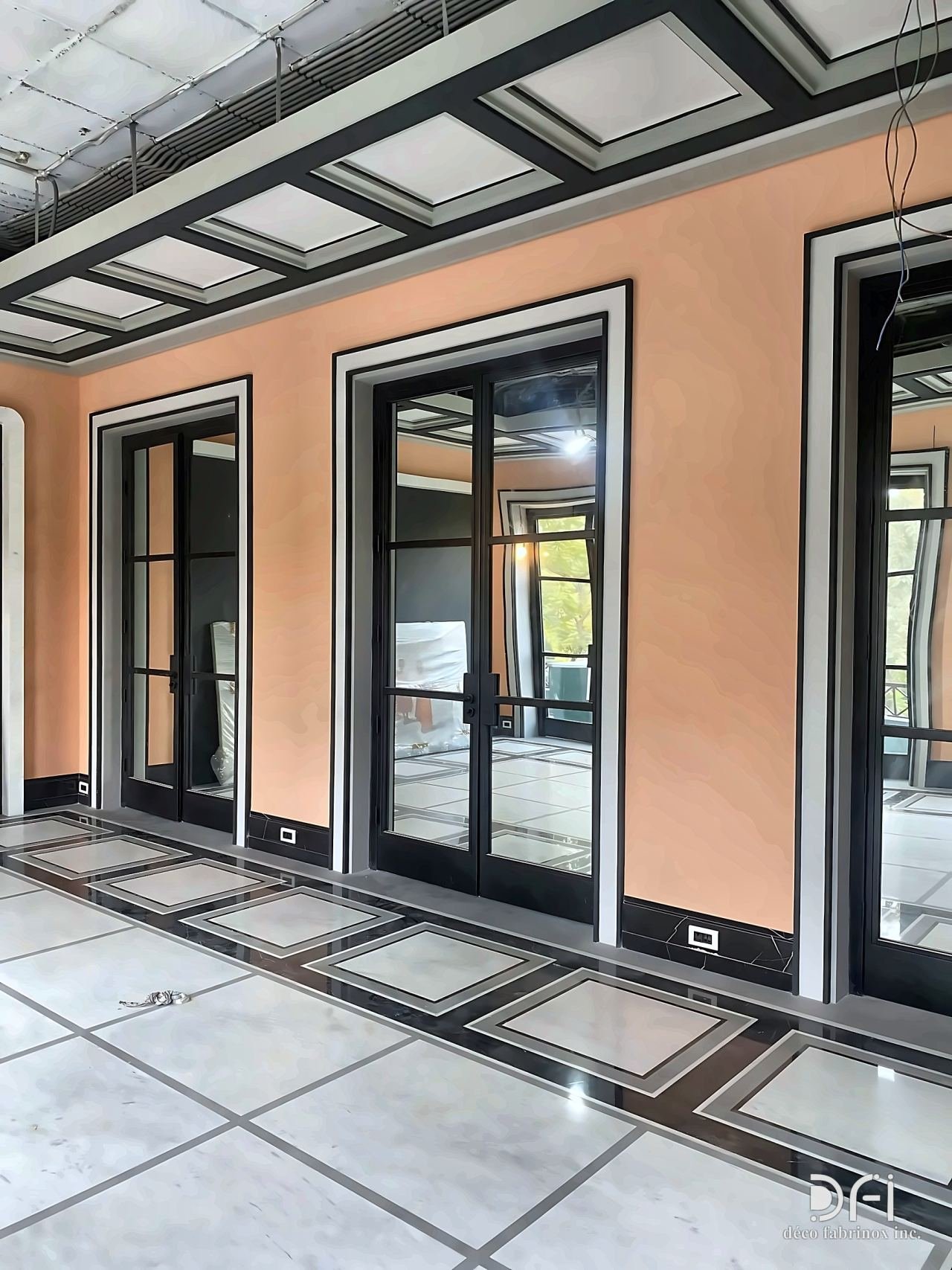 Black steel-framed glazed doors along a corridor