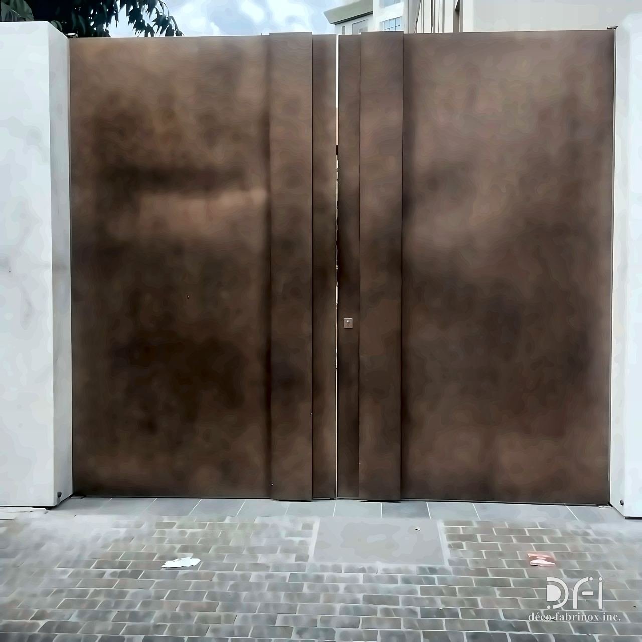 Large bronze-clad pivot gate