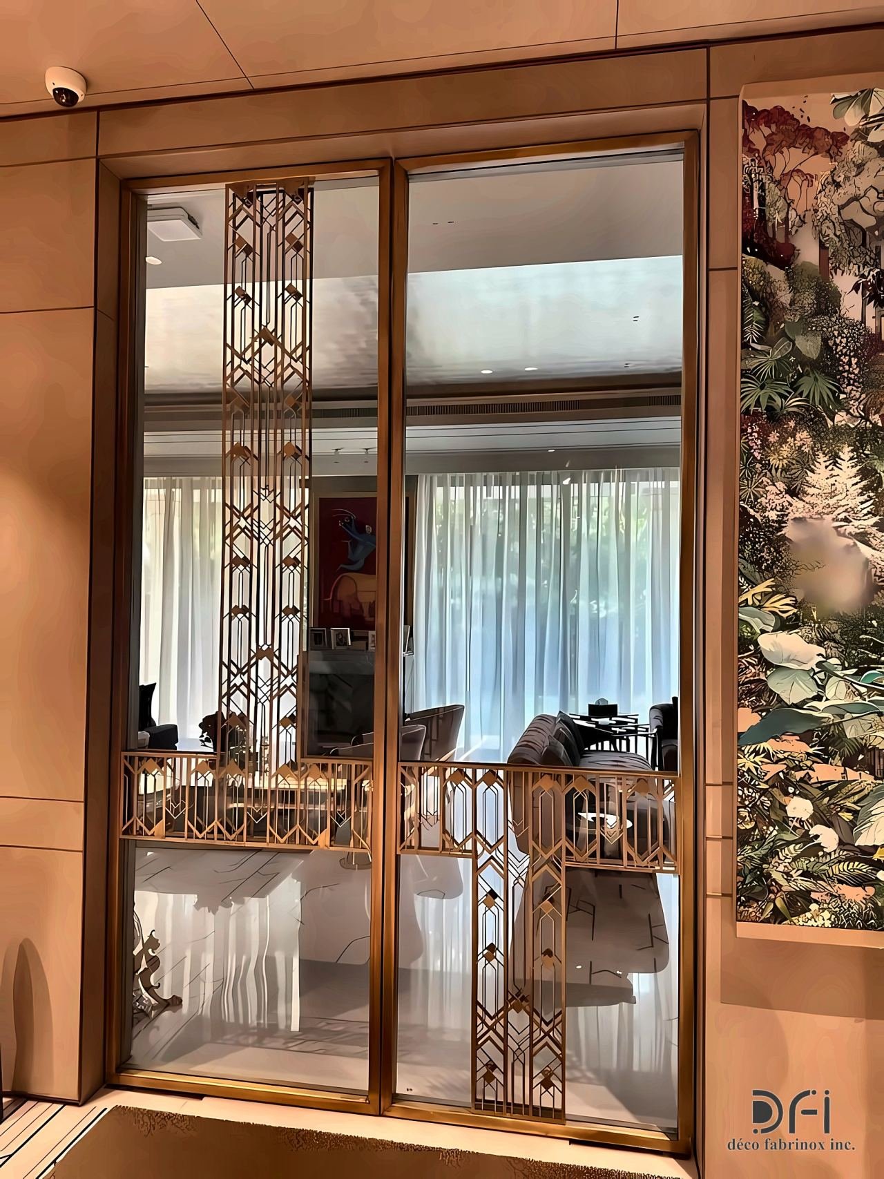 Bronze-framed glass doors with art deco panels