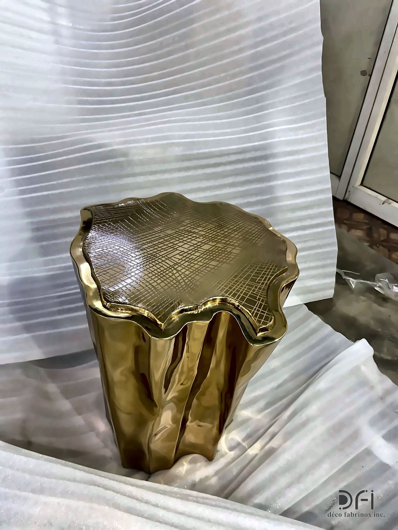Cast brass side table shaped like a tree stump