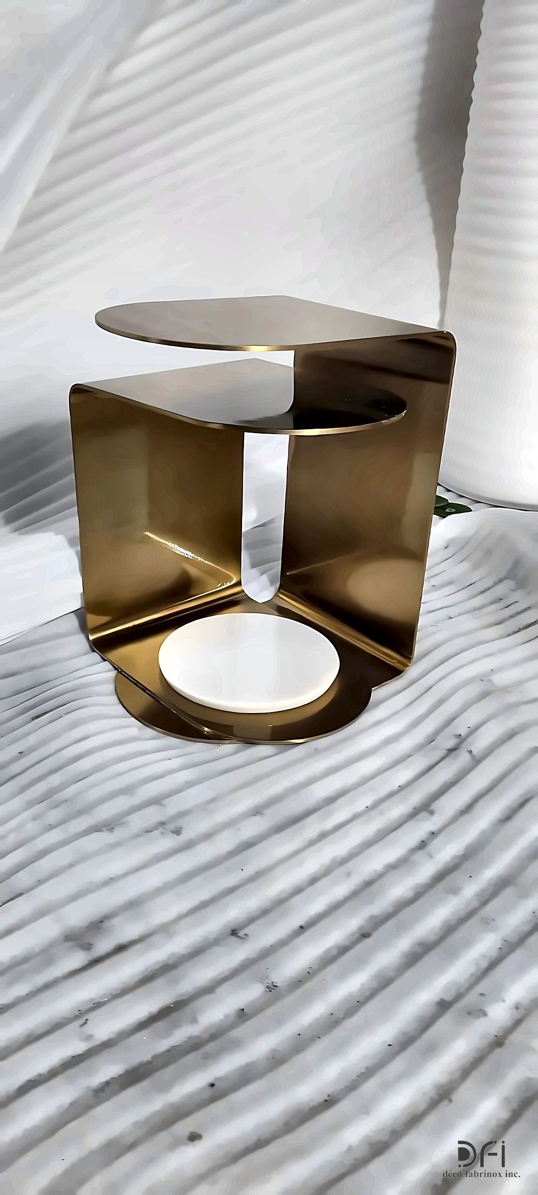 Brass C-shaped side table in the workshop
