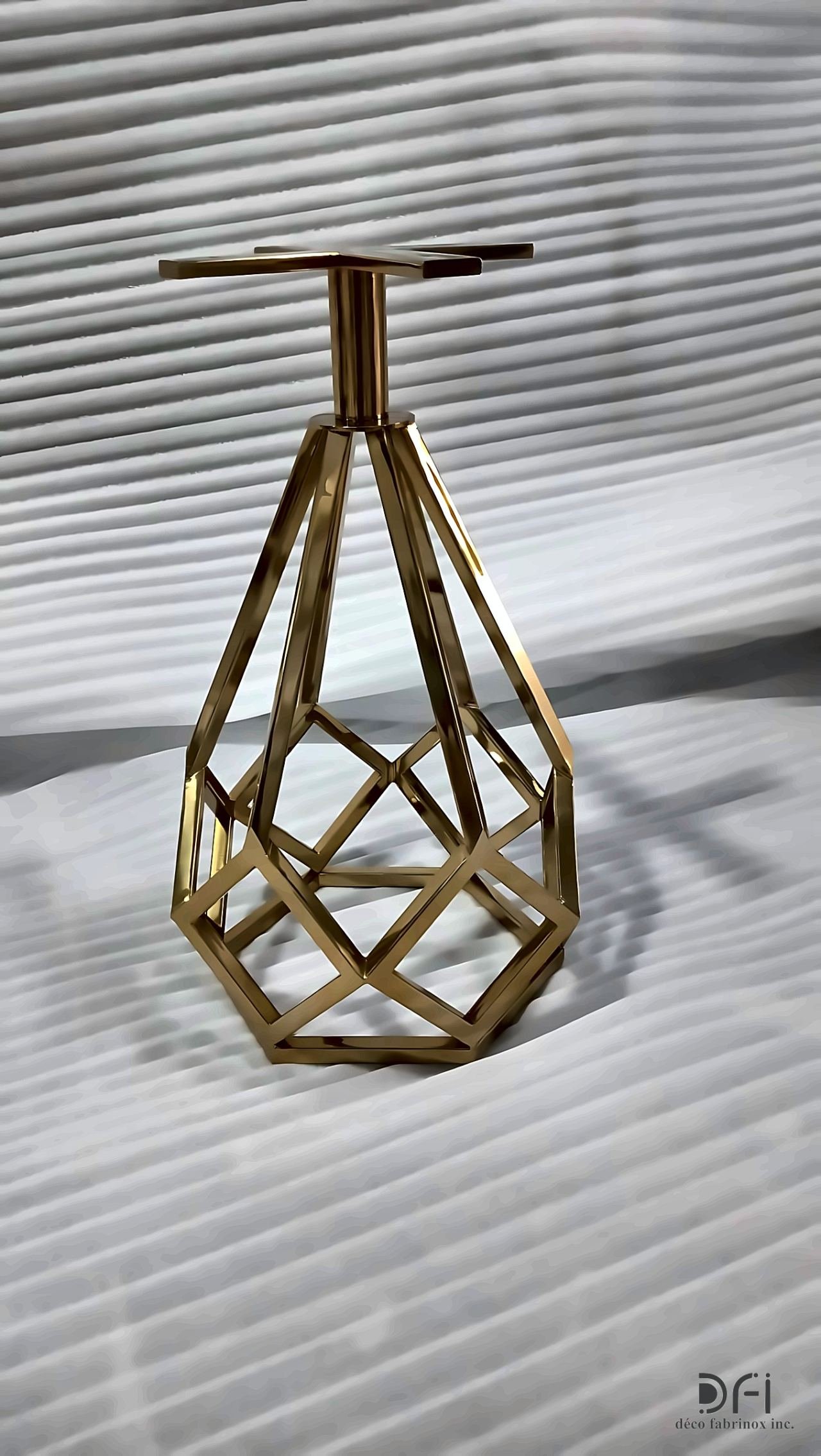 Brass side table on a faceted geometric base