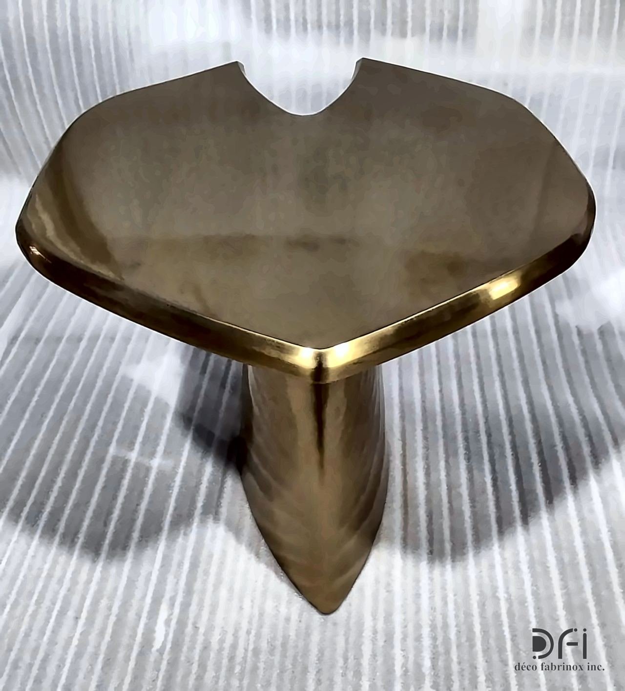 Heart-shaped bronze table with a tapered pedestal
