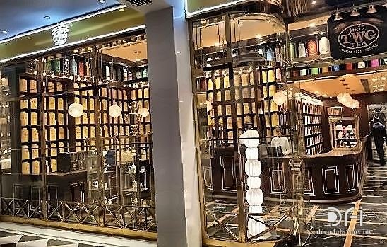 Brass and blackened steel shopfitting in a tea boutique