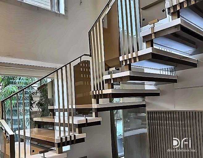 Brass detailing on cantilevered staircase treads