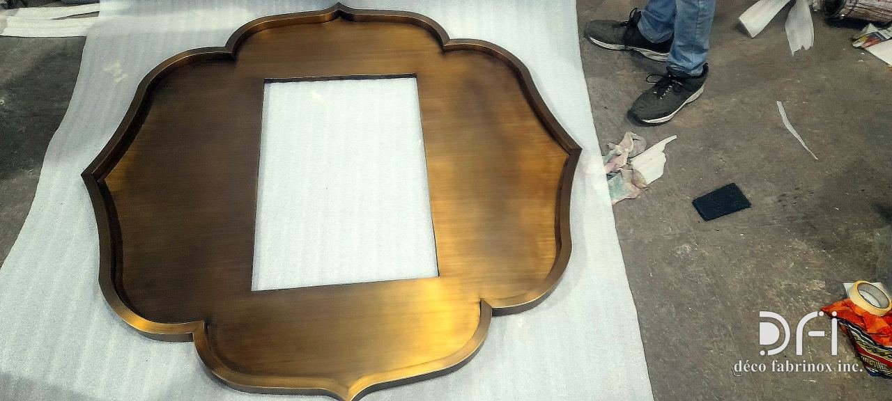 Brass scalloped mirror frame