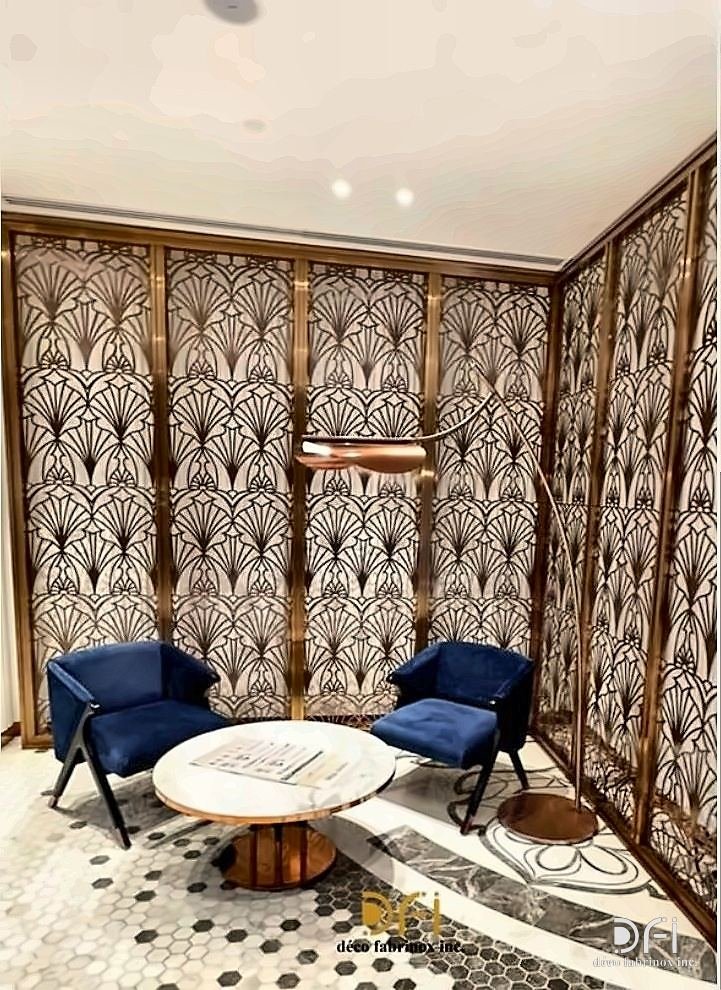 Brass screens enclosing a hotel lounge seating area
