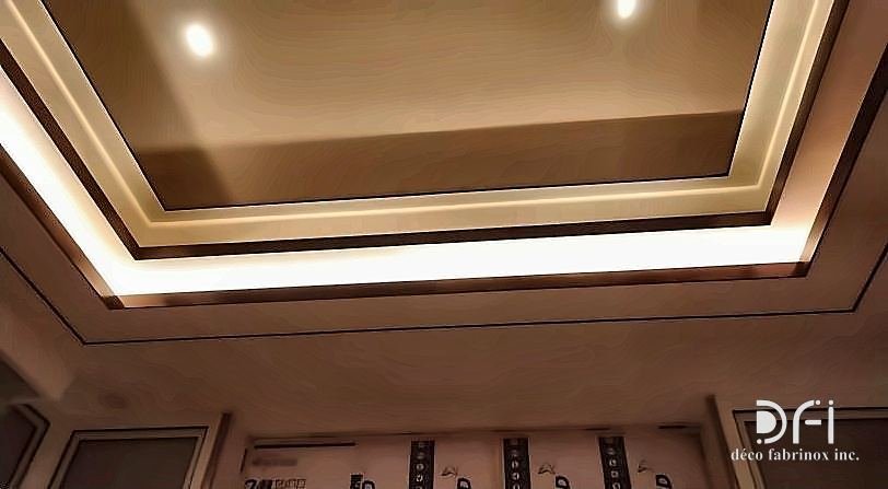 Brass trim on a coffered ceiling