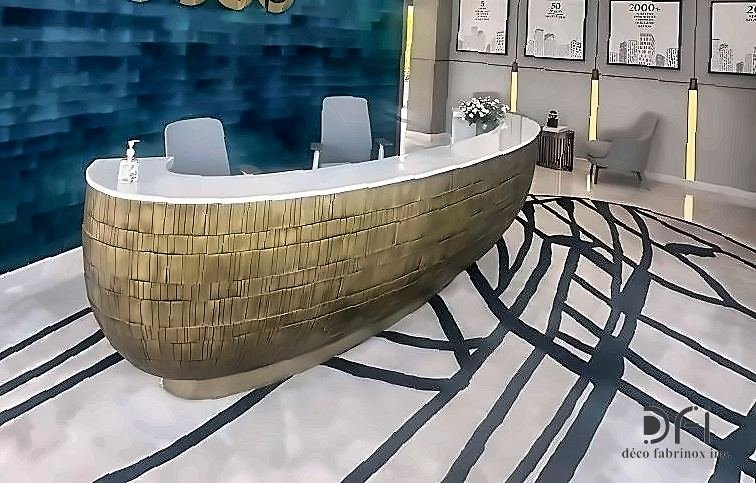 Woven brass reception desk curving across a corporate lobby floor