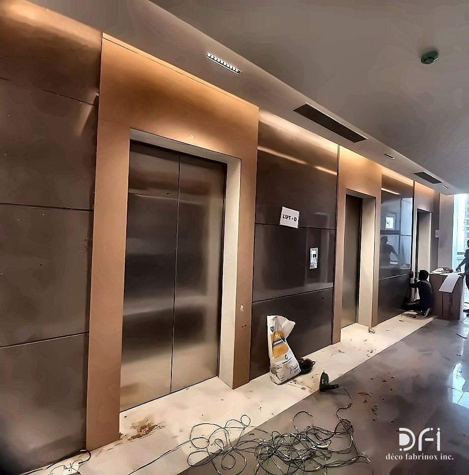 Bronze lift surround along a hotel corridor