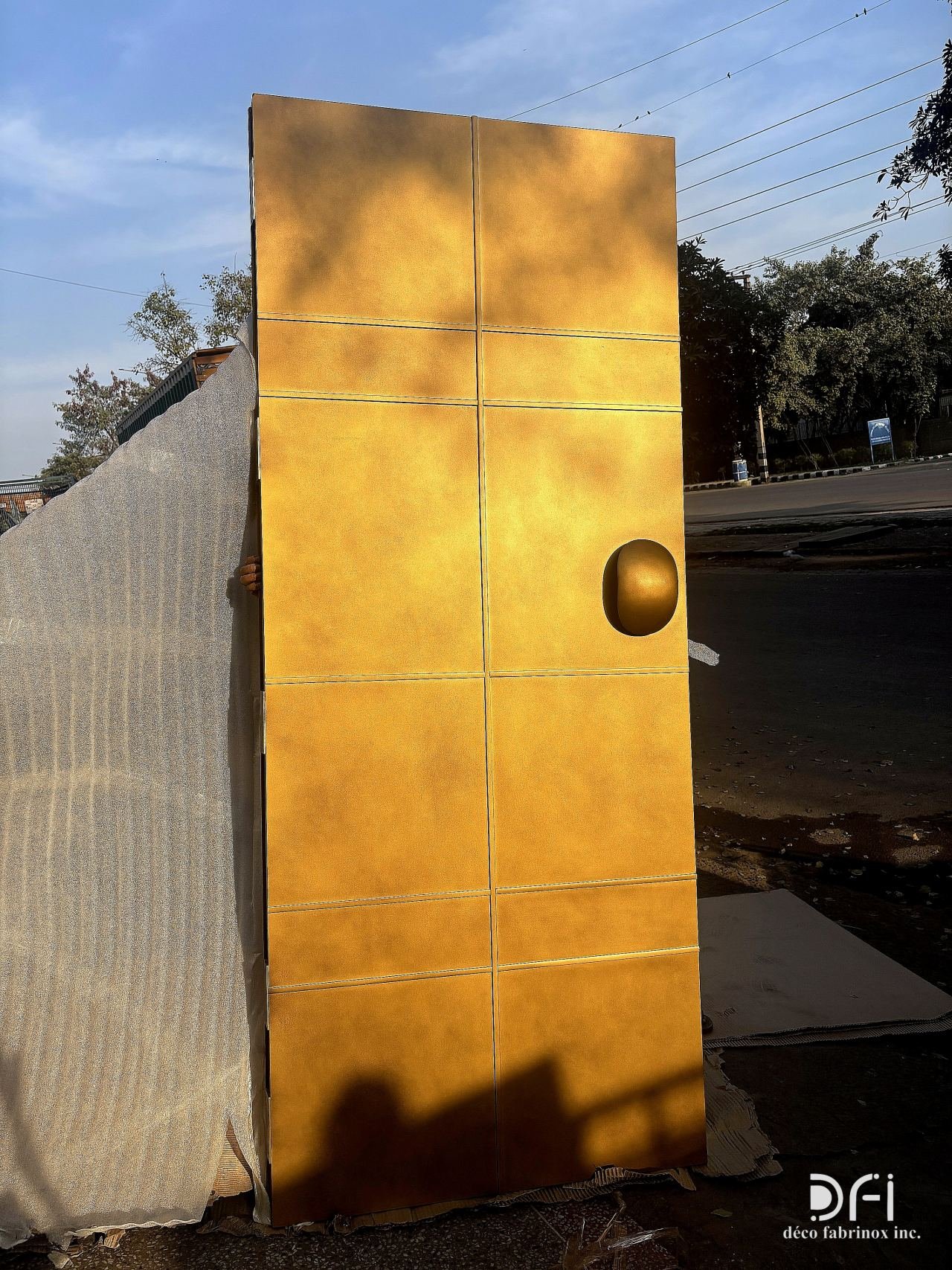 Bronze patina main door with a pebble handle, before fitting