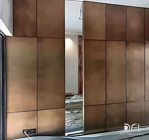 Bronze wall cladding panels in an interior