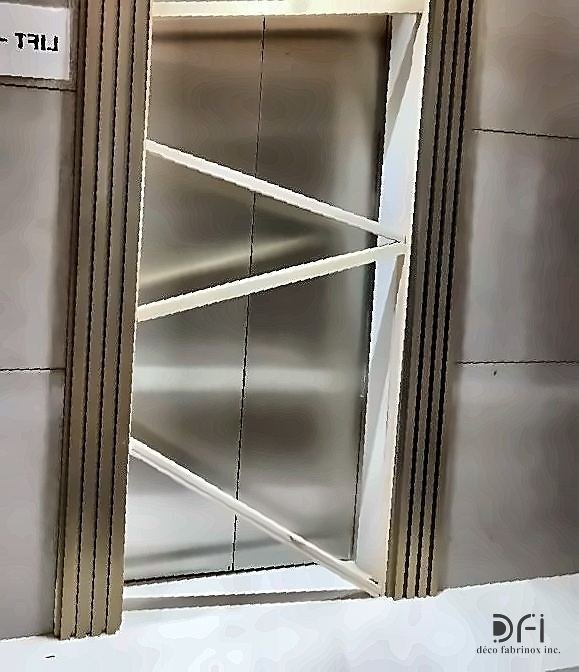Brushed metal lift cladding detail
