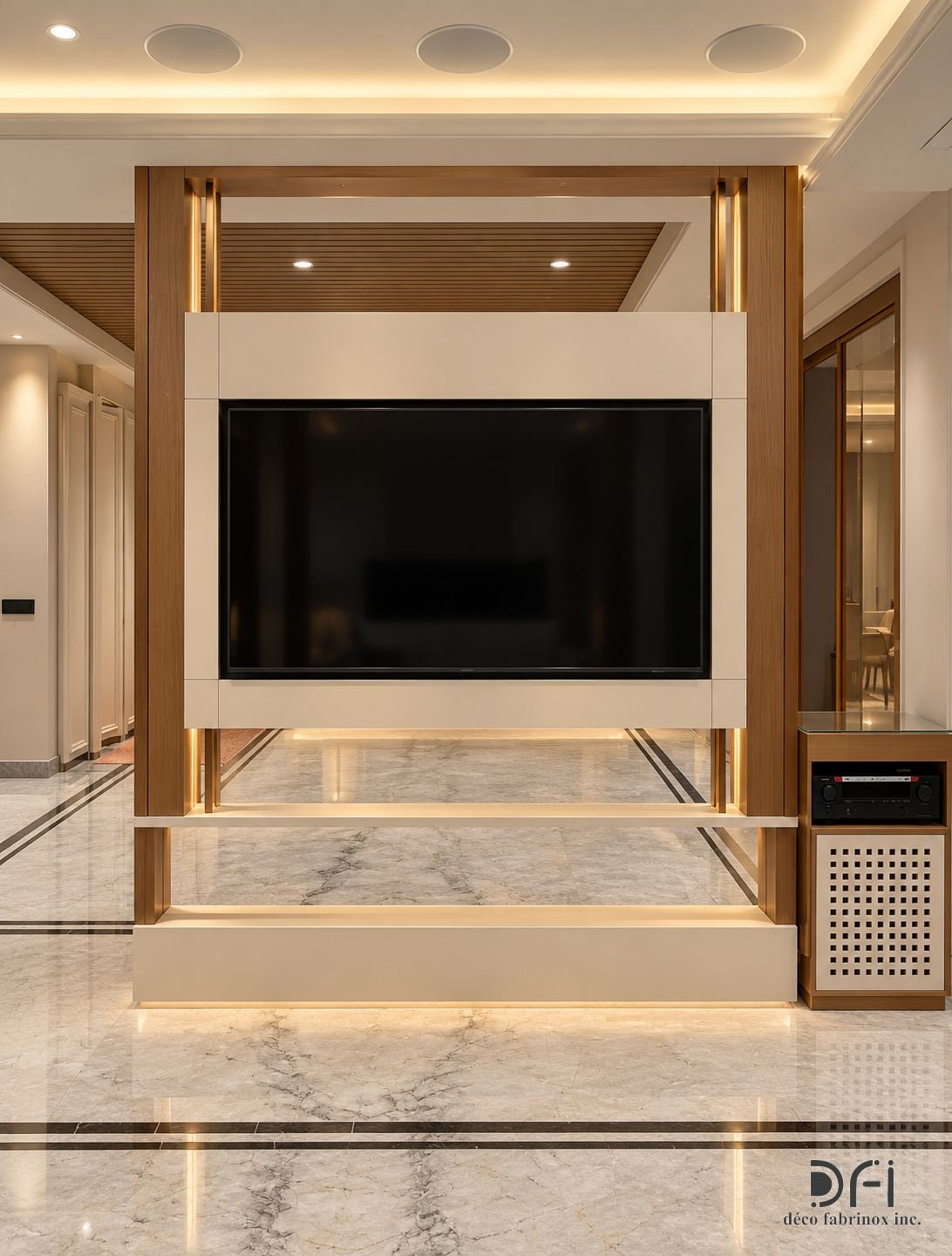 TV wall framed in brushed metal with fluted side panels