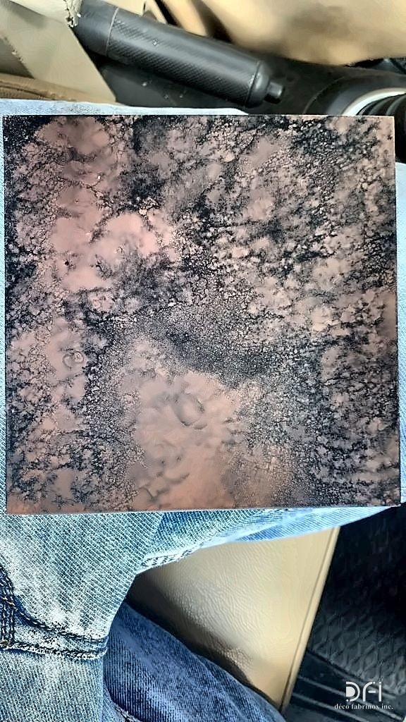 Copper patina sample with dark mottling