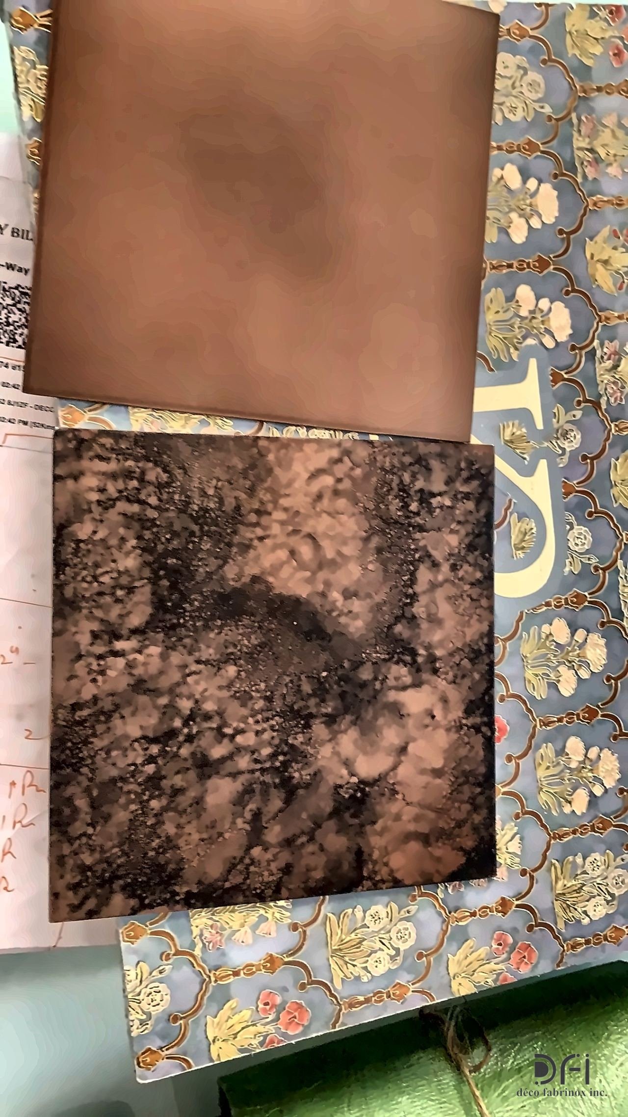 Bronze and copper patina samples on patterned paper