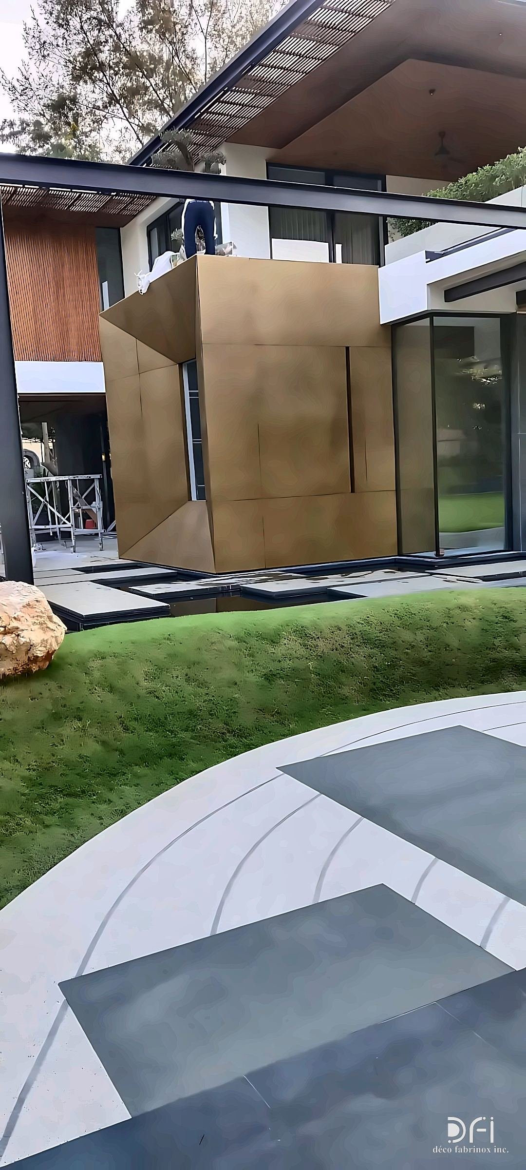 Metal-clad garden pavilion with glass doors