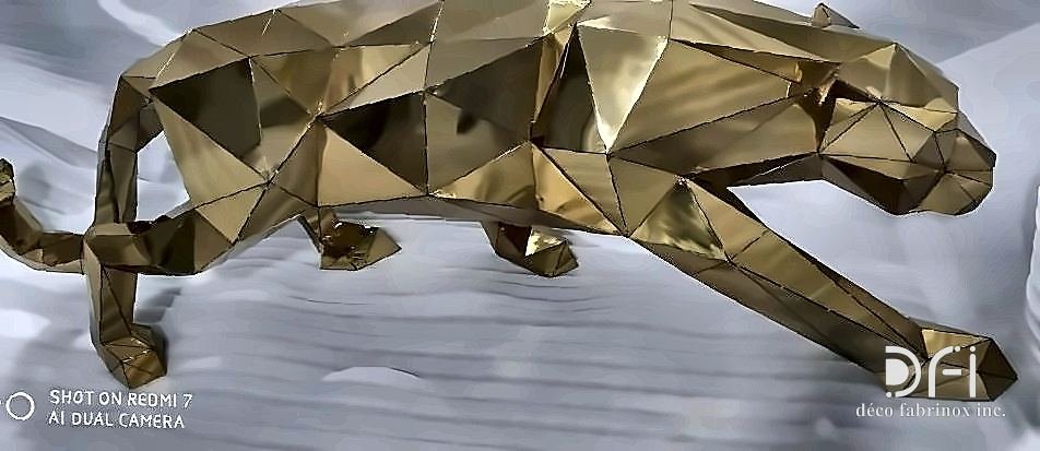 Faceted brass panther sculpture