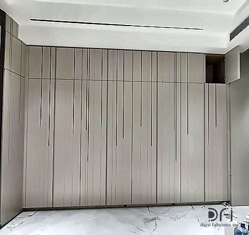 Fluted metal wall cladding running floor to ceiling